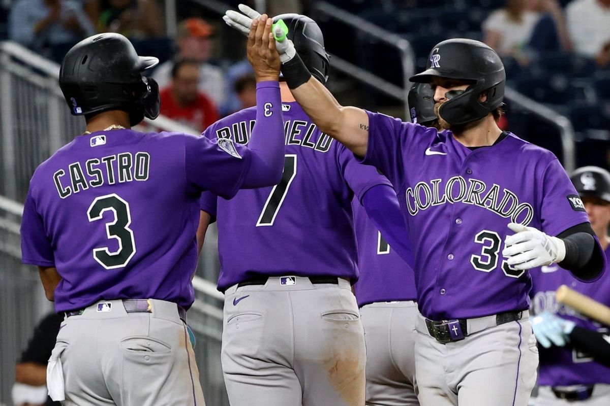 Aug 26, 2026; Washington, District of Columbia, USA;  Colorado Rockies second baseman Connor Norby (35) celebrates with Colorado Rockies third baseman Willi Castro (3) after hitting a grand slam during the seventh inning against the Washington Nationals at Nationals Park.  Mandatory Credit: Daniel Kucin Jr.-Imagn Images