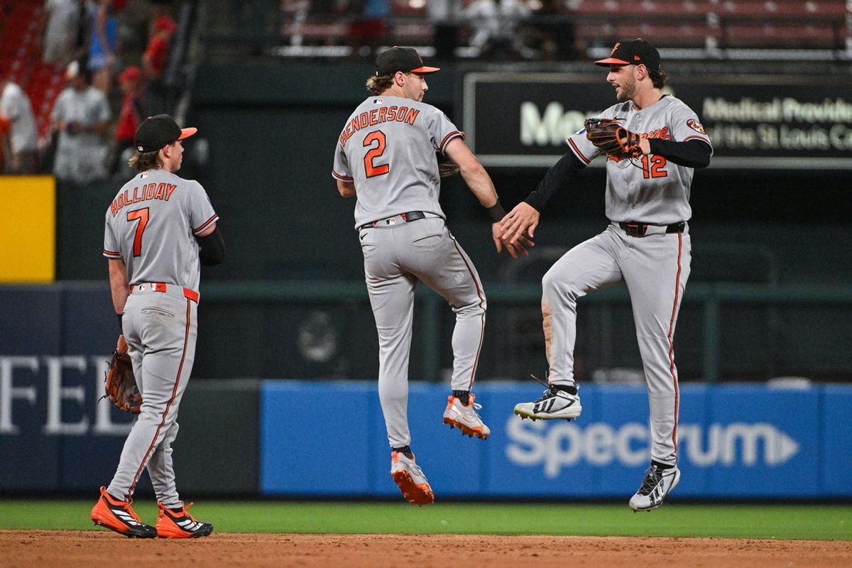 Aug 26, 2026; St. Louis, Missouri, USA; Baltimore Orioles shortstop Gunnar Henderson (2) left fielder Dylan Beavers (12) and second baseman Jackson Holliday (7) celebrate after the Orioles defeated the St. Louis Cardinals at Busch Stadium. Mandatory Credit: Jeff Curry-Imagn Images