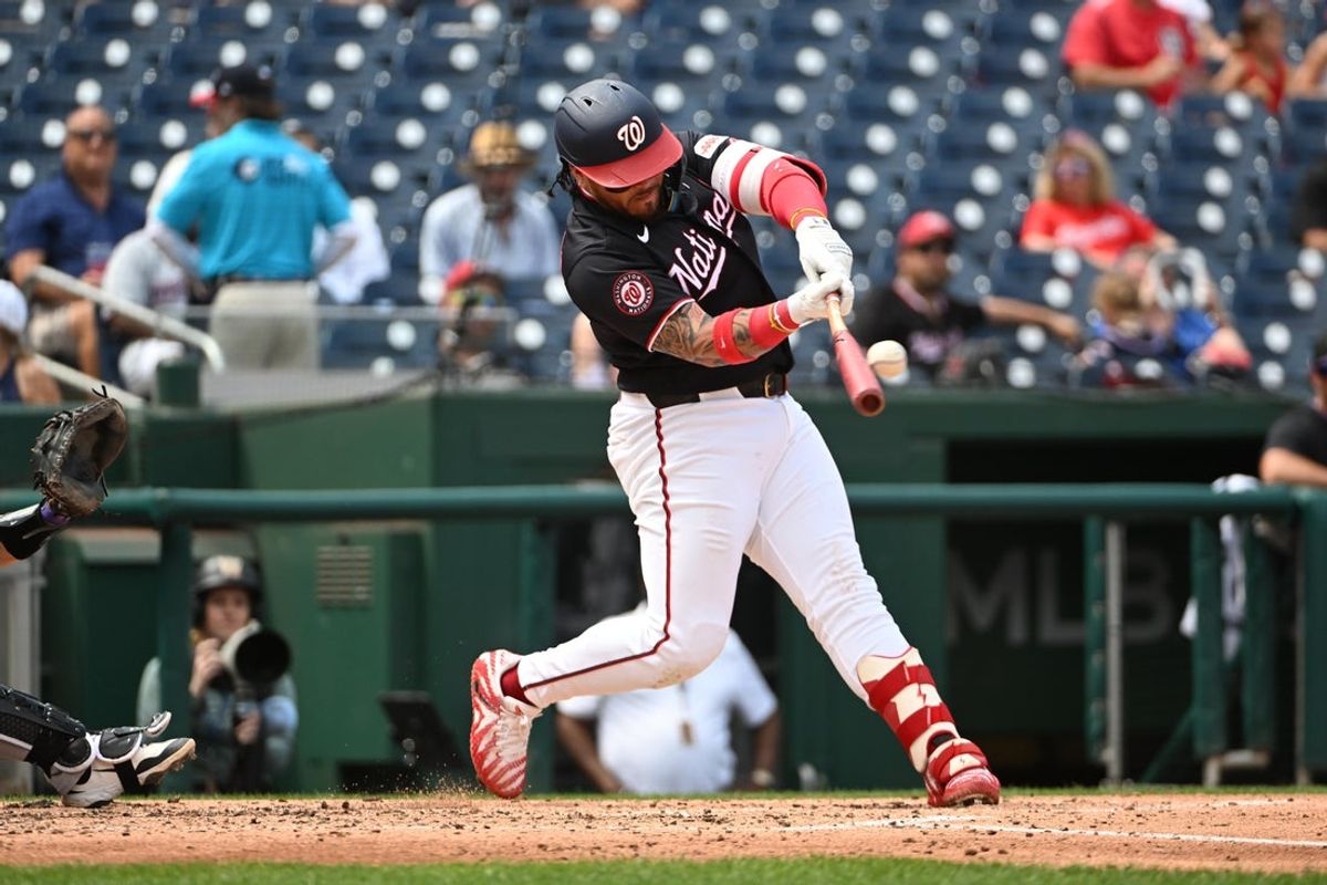 Aug 27, 2026; Washington, District of Columbia, USA; Washington Nationals second baseman Jorbit Vivas (84) singles against the Colorado Rockies during the third inning at Nationals Park. Mandatory Credit: Brad Mills-Imagn Images