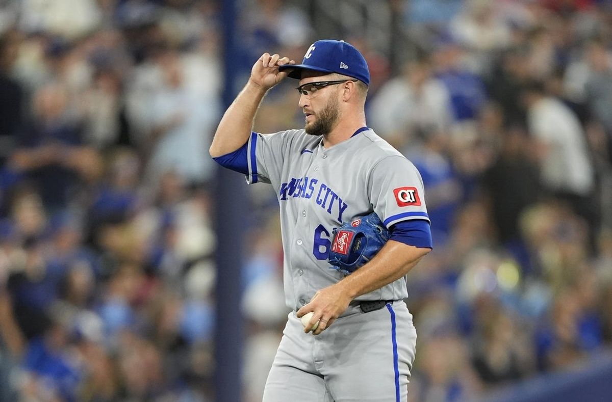 Aug 27, 2026; Toronto, Ontario, CAN;  Kansas City Royals pitcher Noah Cameron (65) reacts after giving up a double in the sixth inning against the Toronto Blue Jays at Rogers Centre.  Mandatory Credit: John E. Sokolowski-Imagn Images