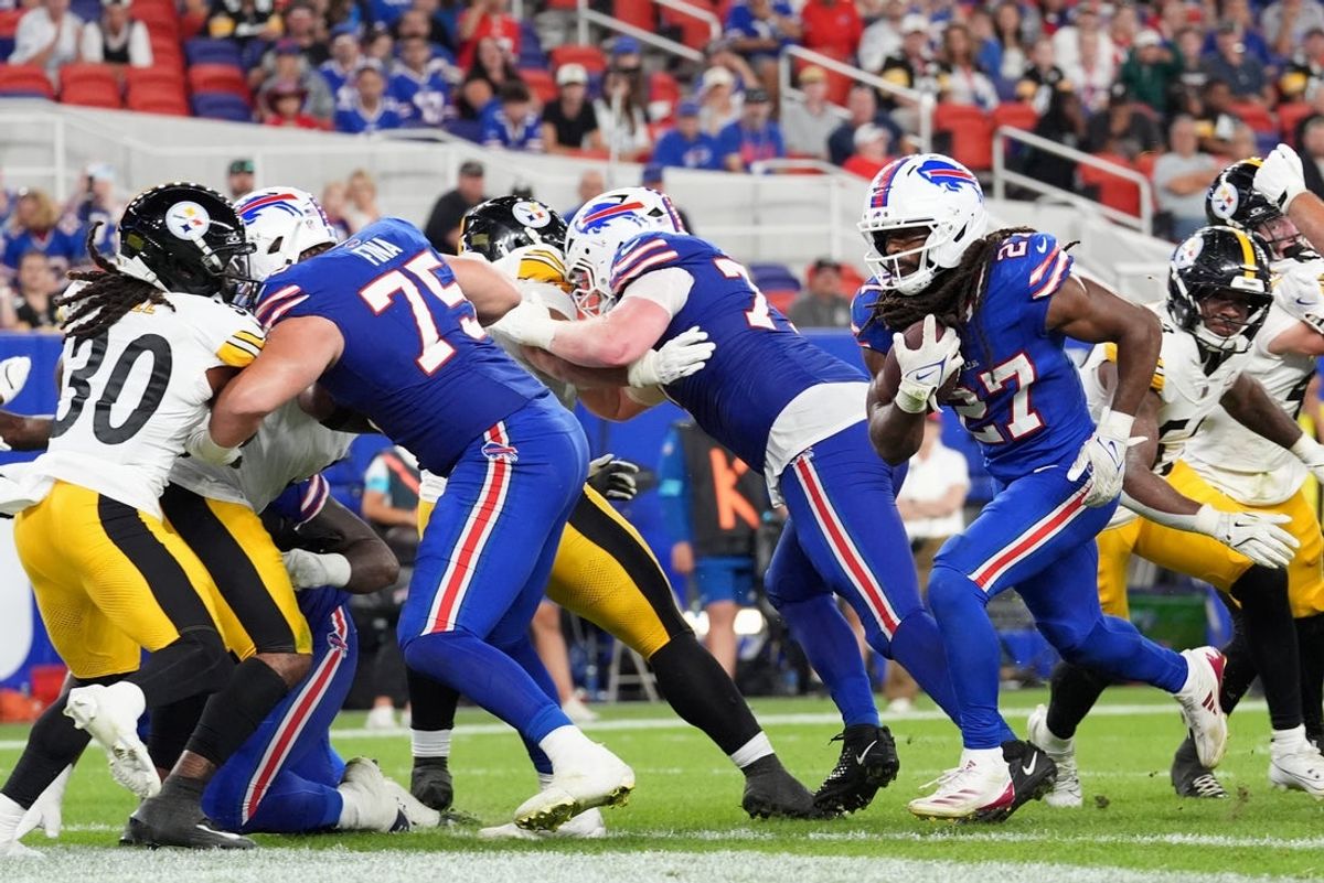Aug 27, 2026; Orchard Park, New York, USA;  Buffalo Bills running back Ian Wheeler (27) scores a touchdown against the Pittsburgh Steelers during the fourth quarter at New Highmark Stadium.  Mandatory Credit: Gregory Fisher-Imagn Images