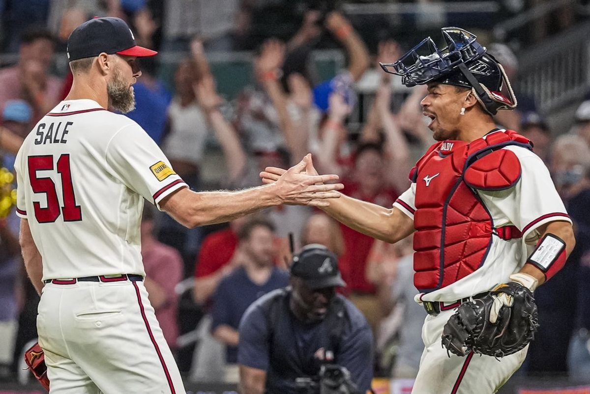 Aug 27, 2026; Cumberland, Georgia, USA; Atlanta Braves pitcher Chris Sale (51) reacts with catcher Drake Baldwin (30) after the Braves defeated the Los Angeles Dodgers at Truist Park. Mandatory Credit: Dale Zanine-Imagn Images