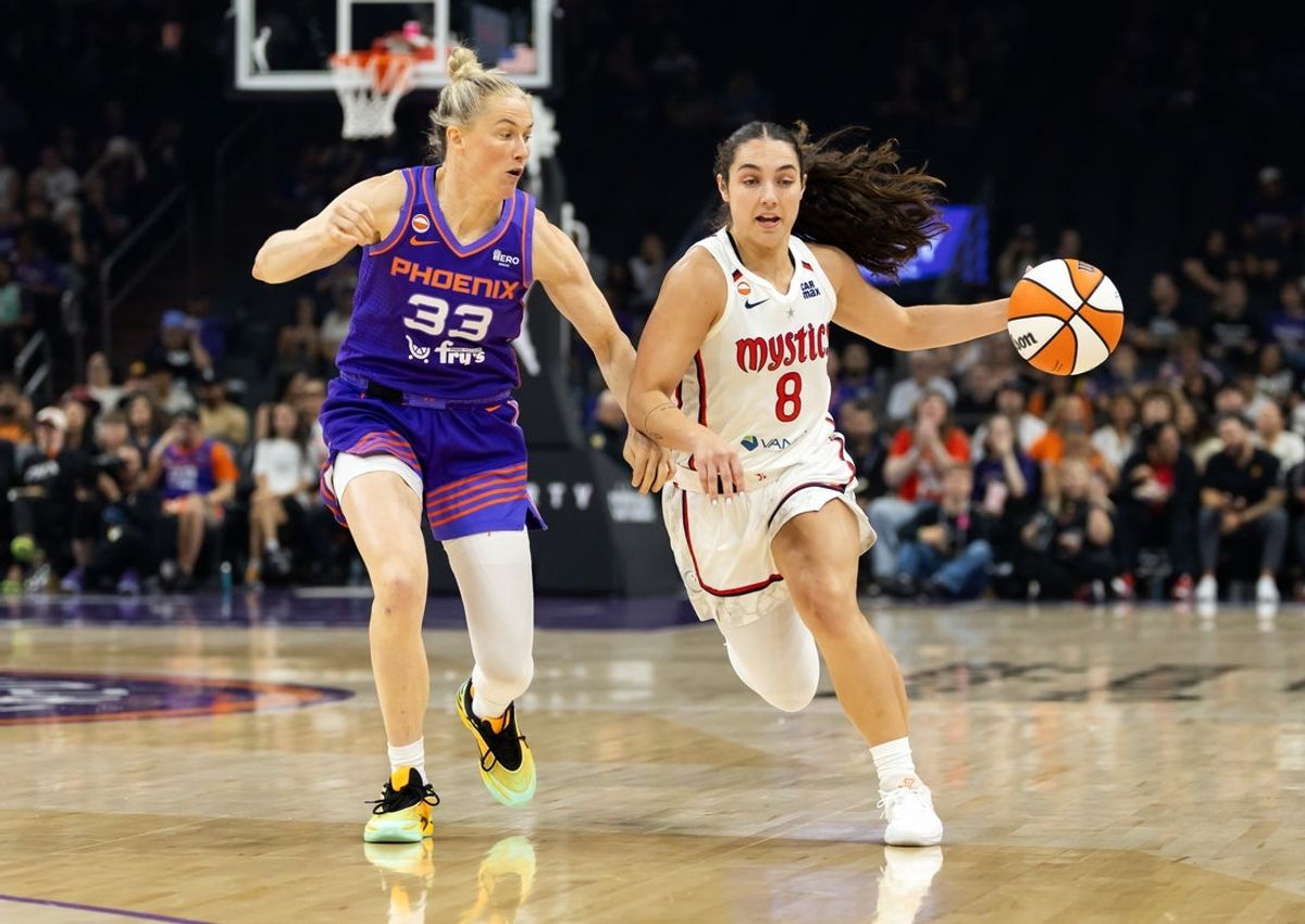 Aug 27, 2026; Phoenix, Arizona, USA; Washington Mystics guard Georgia Amoore (8) against Phoenix Mercury guard Sami Whitcomb (33) in the first half at Mortgage Matchup Center. Mandatory Credit: Mark J. Rebilas-Imagn Images
