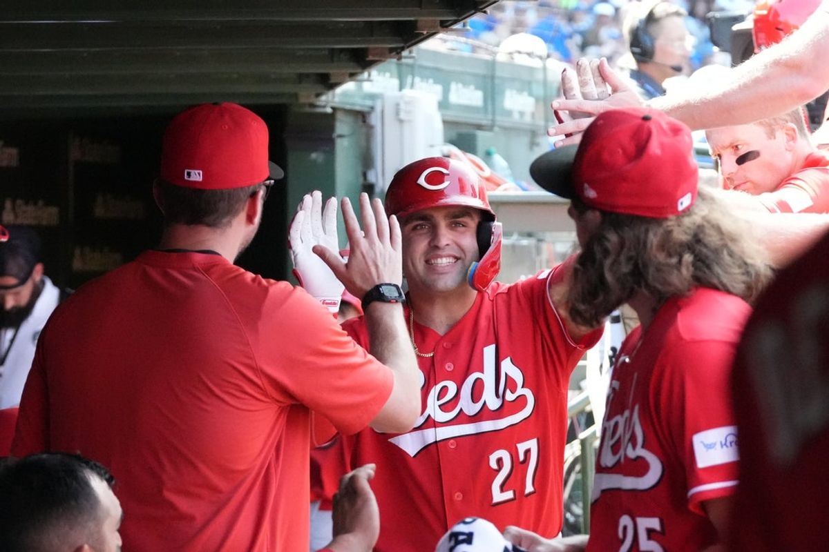 Aug 28, 2026; Chicago, Illinois, USA;  Cincinnati Reds first baseman Sal Stewart (27) is greeted in the dugout after hitting a home against the Chicago Cubs during the fifth inning at Wrigley Field.  Mandatory Credit: David Banks-Imagn Images