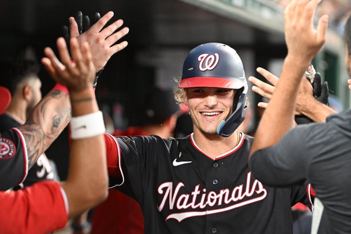 Aug 28, 2026; Washington, District of Columbia, USA; Washington Nationals third baseman Brady House (12) is congratulated by teammates after hitting a three run home against the Miami Marlins during the third inning at Nationals Park. Mandatory Credit: Brad Mills-Imagn Images