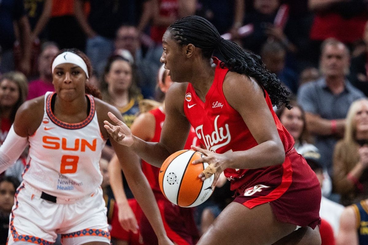 Aug 28, 2026; Indianapolis, Indiana, USA;  Indiana Fever center Aliyah Boston (7) dribbles the ball in the first half against the Connecticut Sun at Gainbridge Fieldhouse.  Mandatory Credit: Trevor Ruszkowski-Imagn Images