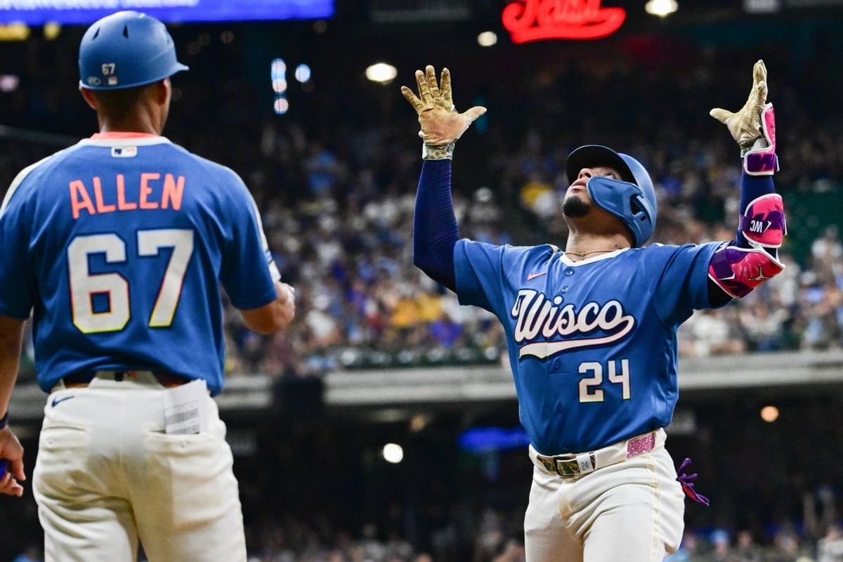 Aug 28, 2026; Milwaukee, Wisconsin, USA;  Milwaukee Brewers catcher William Contreras (24) reacts after driving in a run with a base hit in the seventh inning against the Texas Rangers at American Family Field.  Mandatory Credit: Benny Sieu-Imagn Images