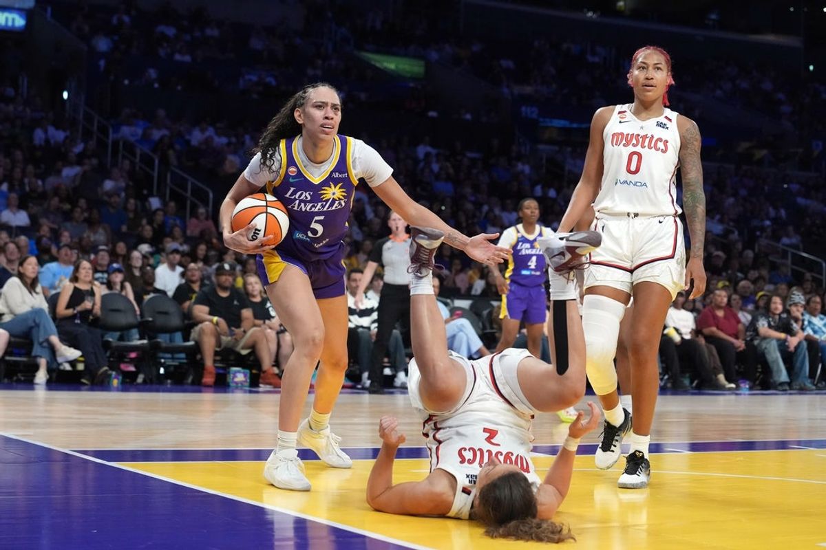 Aug 28, 2026; Los Angeles, California, USA; LA Sparks forward Dearica Hamby (5) drives to the basket against Washington Mystics forward Nyla Harris (2) and center Shakira Austin (0) in the first half at Crypto.com Arena. Mandatory Credit: Kirby Lee-Imagn Images