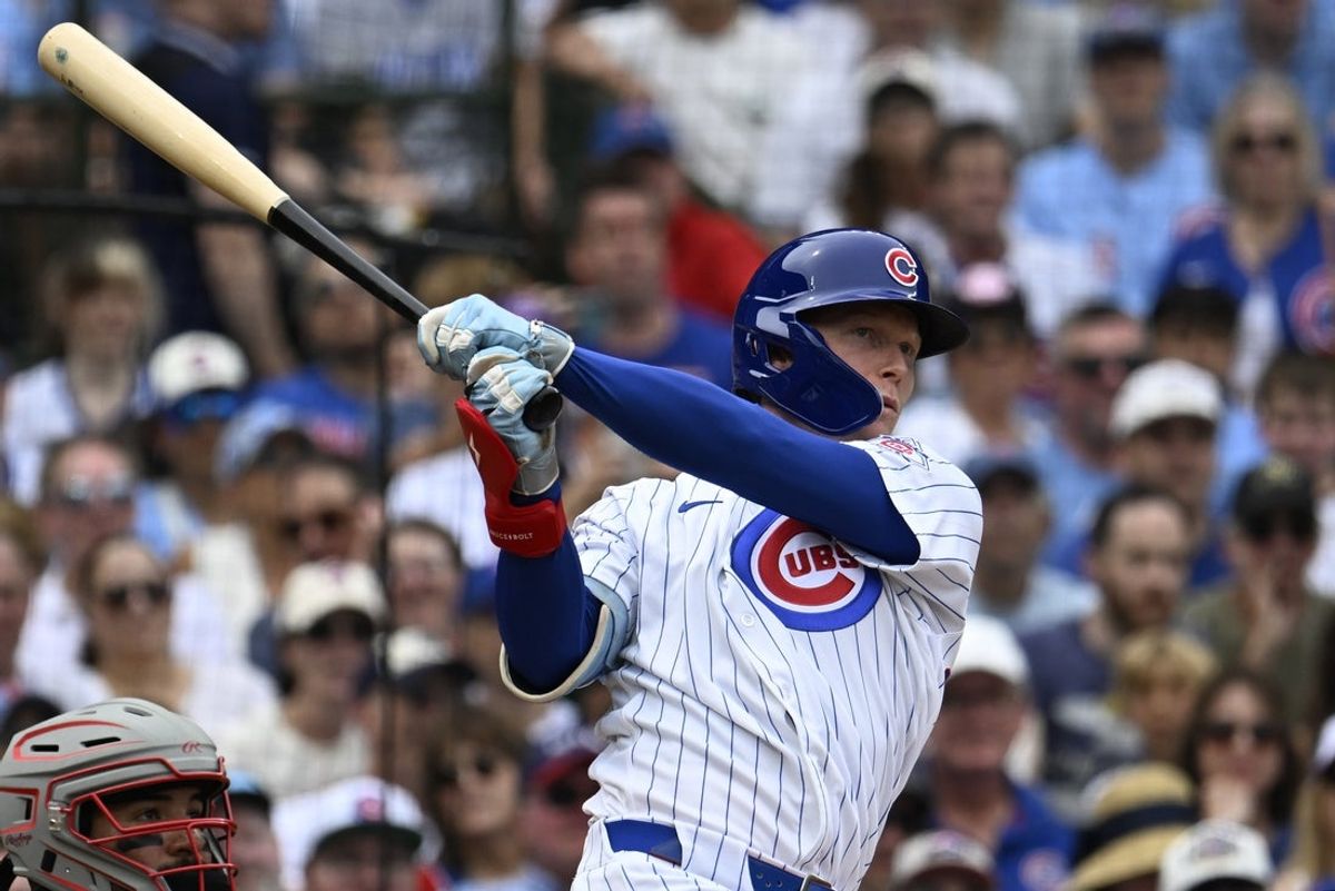 Aug 29, 2026; Chicago, Illinois, USA;  Chicago Cubs center fielder Pete Crow-Armstrong (4) hits a two-run home run during the second inning against the Cincinnati Reds at Wrigley Field.  Mandatory Credit: Matt Marton-Imagn Images
