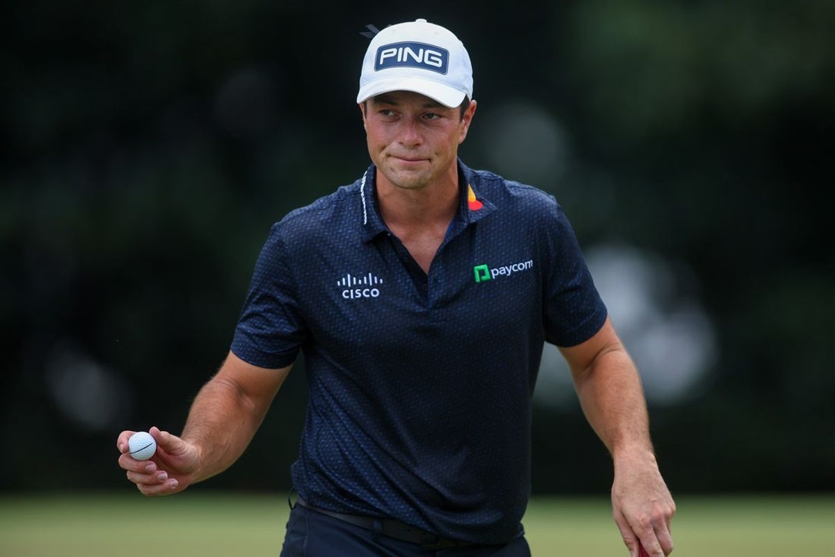 Aug 29, 2026; Atlanta, Georgia, USA; Viktor Hovland reacts after a putt on the second green during the third round of the TOUR Championship golf tournament. Mandatory Credit: Brett Davis-Imagn Images