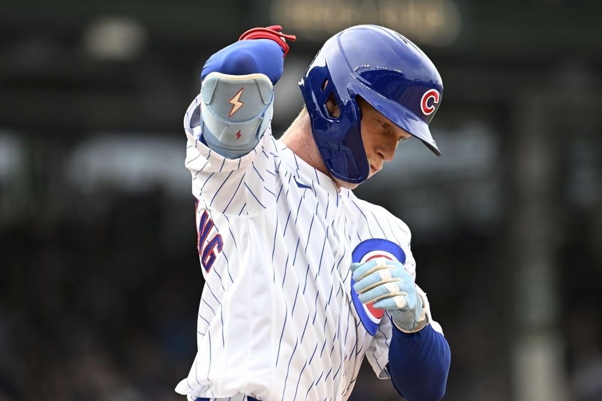 Aug 29, 2026; Chicago, Illinois, USA;  Chicago Cubs center fielder Pete Crow-Armstrong (4) pats his back after he hit a three-run home run against the Cincinnati Reds during the seventh inning at Wrigley Field.  Mandatory Credit: Matt Marton-Imagn Images