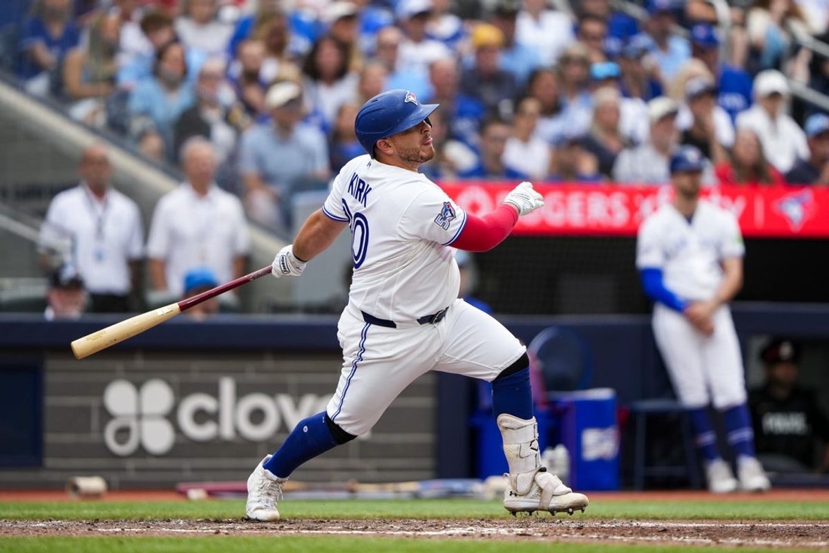 Aug 29, 2026; Toronto, Ontario, CAN;  Toronto Blue Jays catcher Alejandro Kirk (30) hits a RBI single against the Seattle Mariners during the sixth inning at Rogers Centre.  Mandatory Credit: Kevin Sousa-Imagn Images