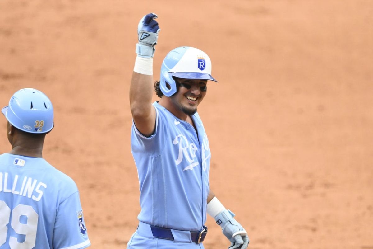 Aug 29, 2026; Cleveland, Ohio, USA;  Kansas City Royals pinch hitter Josh Rojas (40) celebrates his two-RBI single in the sixth inning against the Cleveland Guardians at Progressive Field.  Mandatory Credit: David Richard-Imagn Images