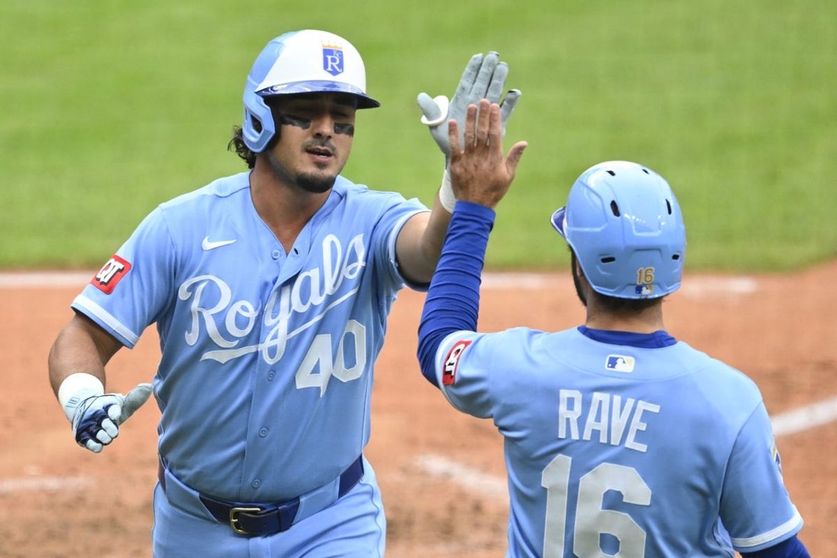 Aug 29, 2026; Cleveland, Ohio, USA;  Kansas City Royals third baseman Josh Rojas (40) celebrates his two-run home run with right fielder John Rave (16) in the eighth inning against the Cleveland Guardians at Progressive Field.  Mandatory Credit: David Richard-Imagn Images