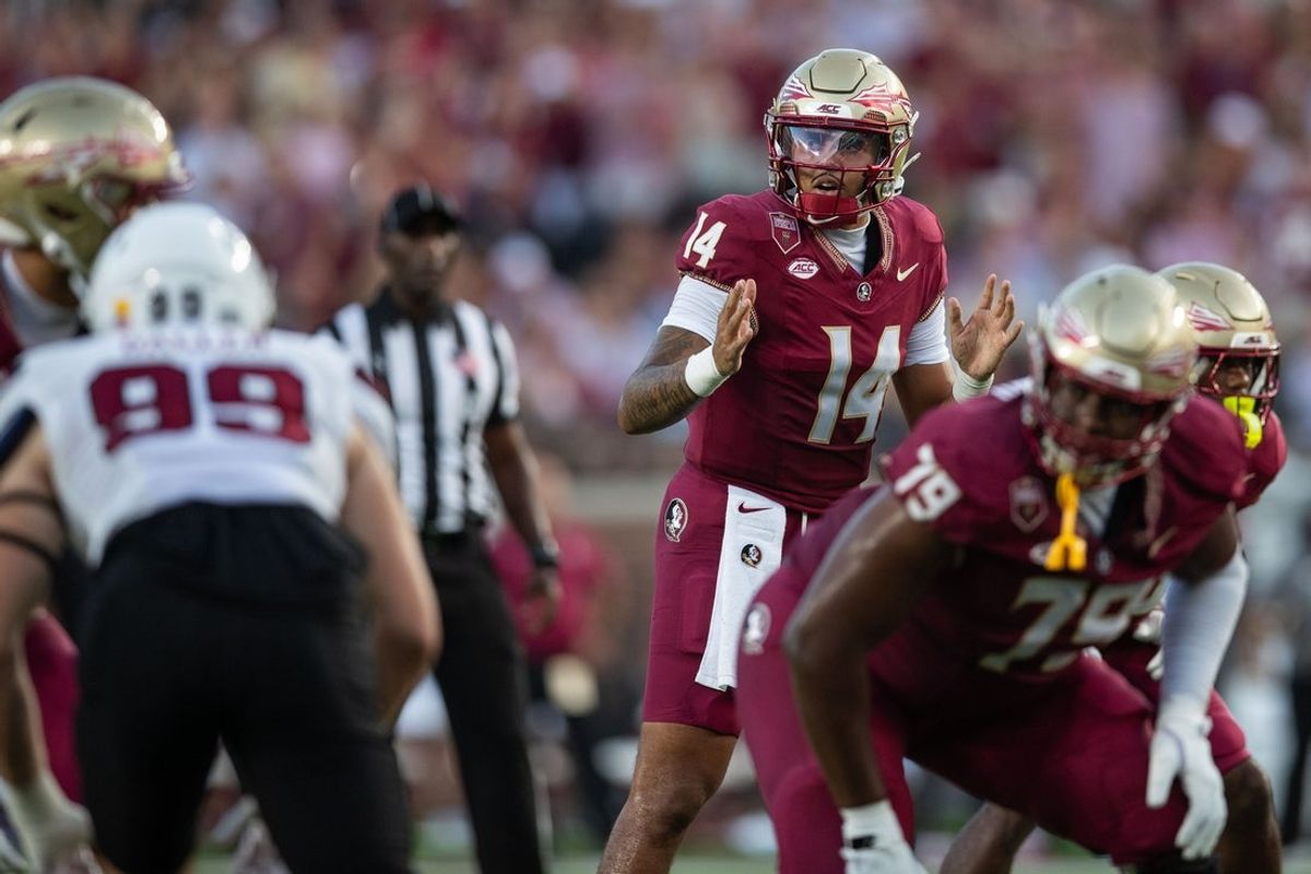 Florida State Seminoles quarterback Ashton Daniels (14) calls a play before the snap. The Florida State Seminoles lead the New Mexico State Aggies 17-7 at the half on Saturday, Aug. 29, 2026.