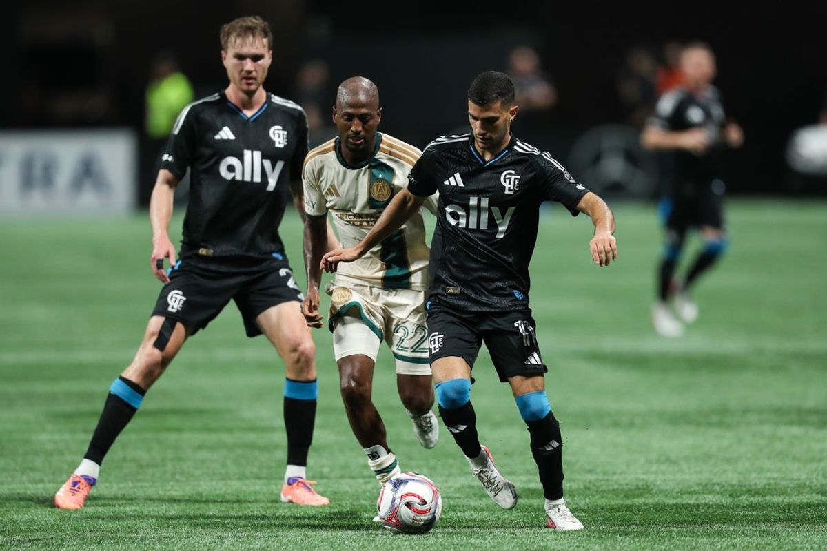 Aug 29, 2026; Atlanta, Georgia, USA;  Charlotte FC forward Liel Abada (11) dribbles defended by Atlanta United forward Fafa Picault (22) during the first half at Mercedes-Benz Stadium.  Mandatory Credit: Mady Mertens-Imagn Images