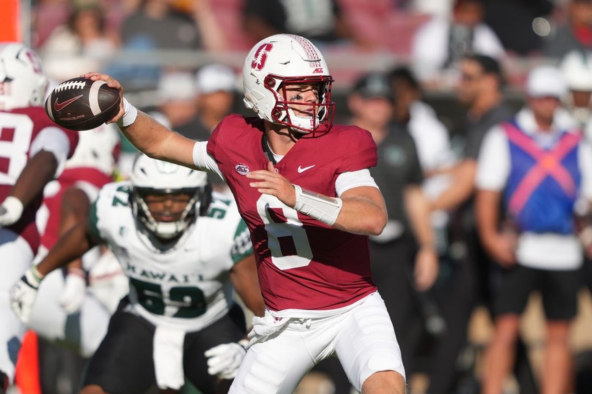 Aug 29, 2026; Stanford, California, USA; Stanford Cardinal quarterback Davis Warren (8) throws a pass against the Hawaii Rainbow Warriors during the second quarter at Stanford Stadium. Mandatory Credit: Darren Yamashita-Imagn Images