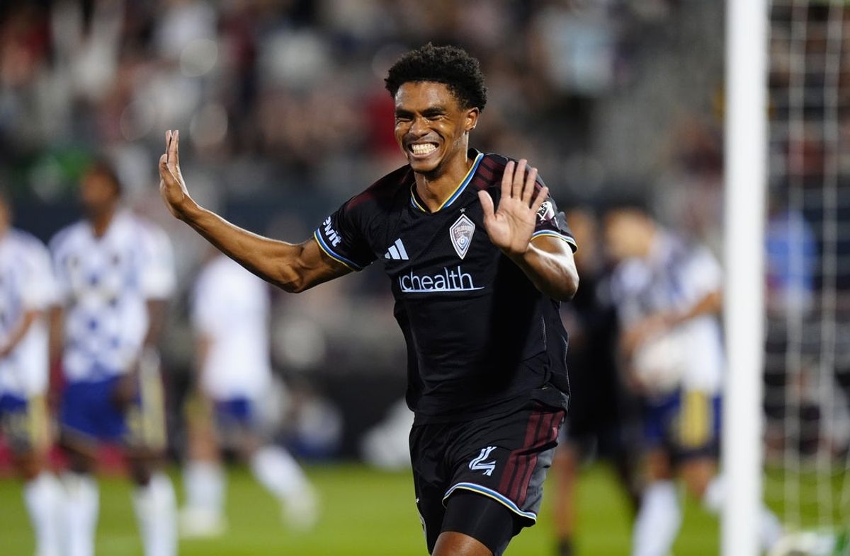 Aug 29, 2026; Commerce City, Colorado, USA;  Colorado Rapids defender Reggie Cannon (4) celebrates his goal in the second half goal against Real Salt Lake at Dick's Sporting Goods Park.  Mandatory Credit: Ron Chenoy-Imagn Images