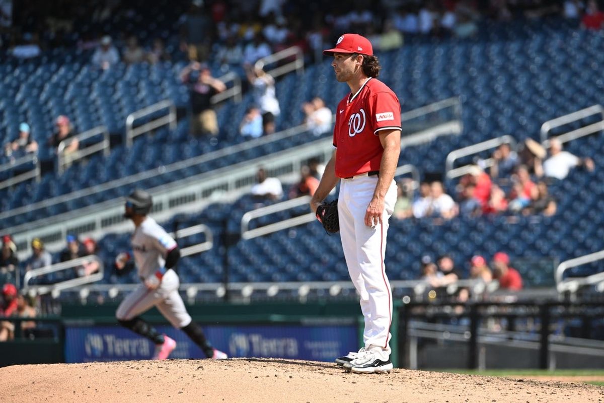 Aug 30, 2026; Washington, District of Columbia, USA; Washington Nationals pitcher Tom Cosgrove (34) reacts after giving up a two run home run to Miami Marlins shortstop Otto Lopez (6) during the ninth inning at Nationals Park. Mandatory Credit: Brad Mills-Imagn Images