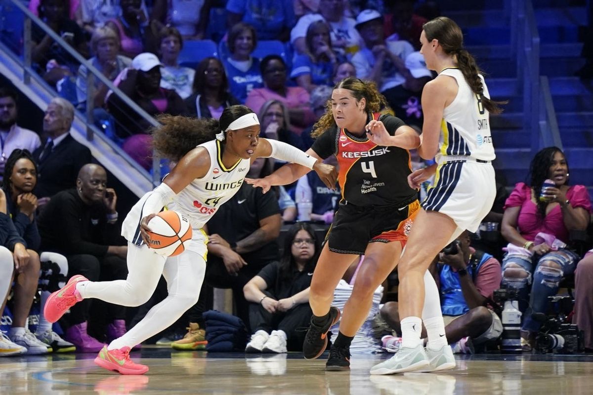 Aug 30, 2026; Arlington, Texas, USA;  Dallas Wings guard Arike Ogunbowale (24) works around the screen set by forward Alanna Smith (8) on Connecticut Sun guard Charlisse Leger-Walker (4) during the first quarter at College Park Center. Mandatory Credit: Raymond Carlin III-Imagn Images