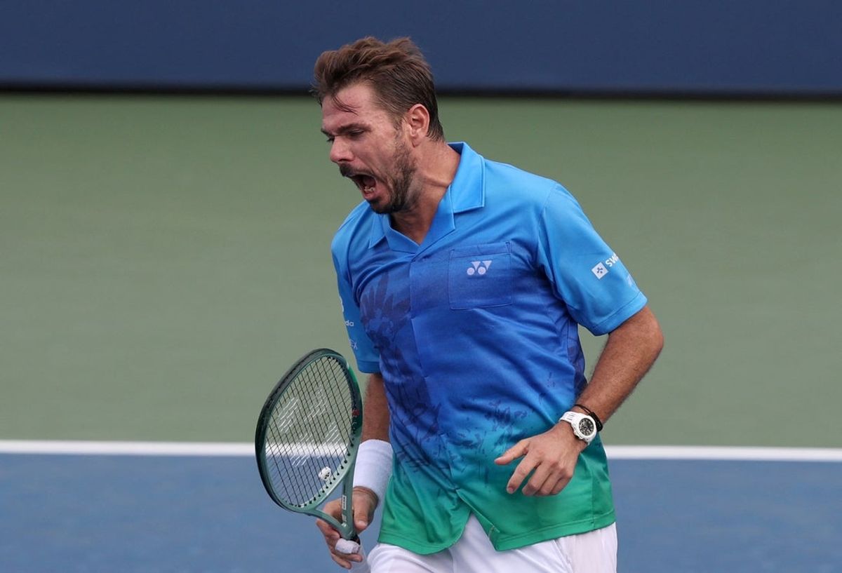 August 31, 2026; New York, United States;  Switzerland's Stan Wawrinka reacts during his first round match against Italy's Matteo Berrettini.  Mandatory Credit: Amber Searls-Imagn Images