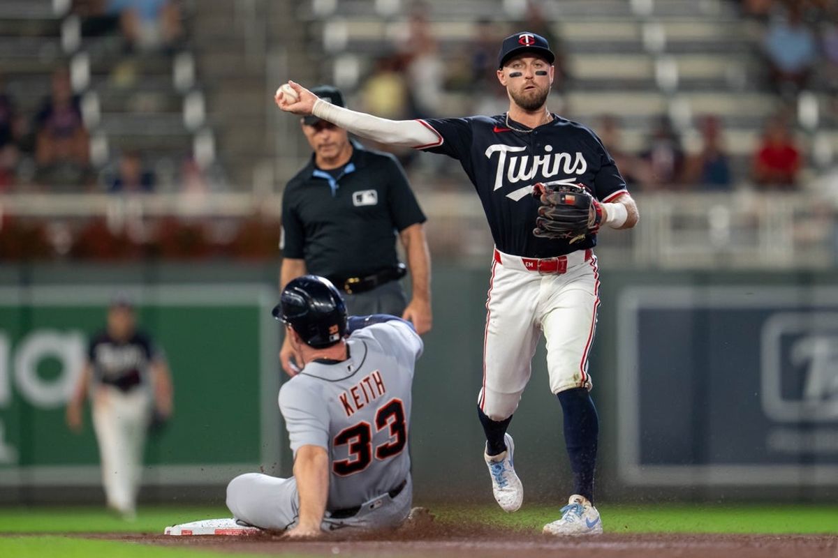 Aug 31, 2026; Minneapolis, Minnesota, USA;  Minnesota Twins second baseman Kody Clemens (2) forces out Detroit Tigers designated hitter Colt Keith (33) at second base and throws the ball to first base for a double play in the sixth inning at Target Field.  Mandatory Credit: Jesse Johnson-Imagn Images