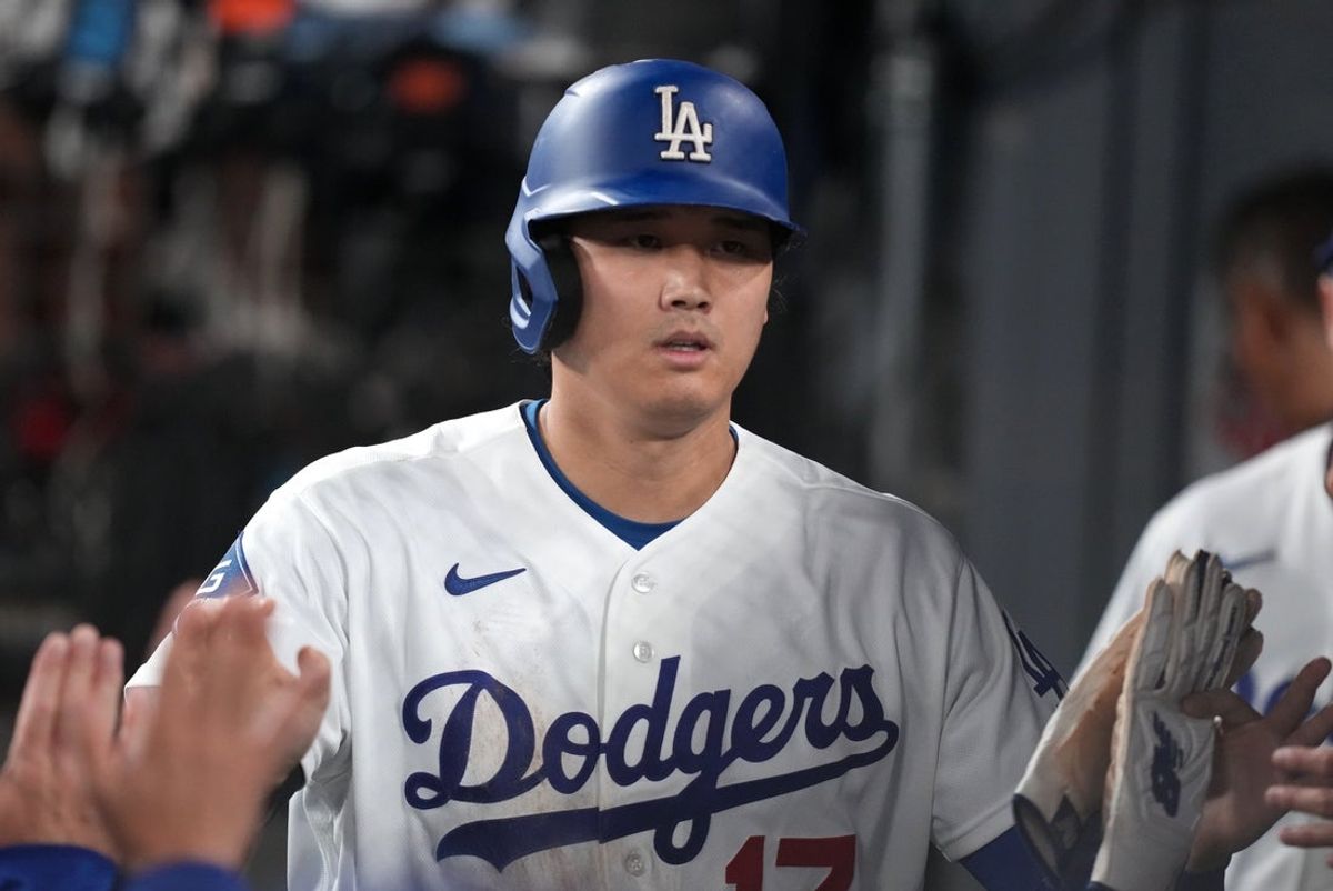 Sep 1, 2026; Los Angeles, California, USA;  Los Angeles Dodgers pitcher Shohei Ohtani (17) celebrates in the dugout after scoring a run during the seventh inning against the St. Louis Cardinals at Dodger Stadium.  Mandatory Credit: Kirby Lee-Imagn Images