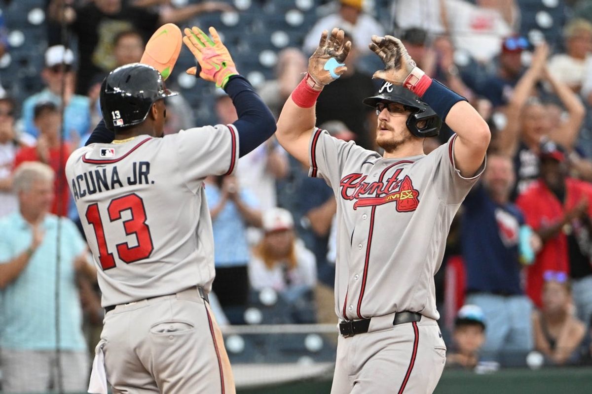 Sep 2, 2026; Washington, District of Columbia, USA; Atlanta Braves catcher Sean Murphy (12) is congratulated by right fielder Ronald Acuña Jr. (13) after hitting a three run home run against the Washington Nationals during the sixth inning at Nationals Park. Mandatory Credit: Brad Mills-Imagn Images