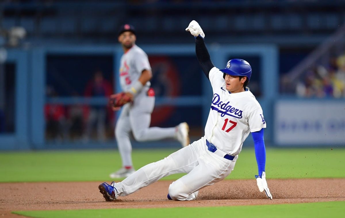 Sep 2, 2026; Los Angeles, California, USA;  Los Angeles Dodgers pitcher Shohei Ohtani (17) steals second during the second inning against the St. Louis Cardinals at Dodger Stadium.  Mandatory Credit: Gary A. Vasquez-Imagn Images