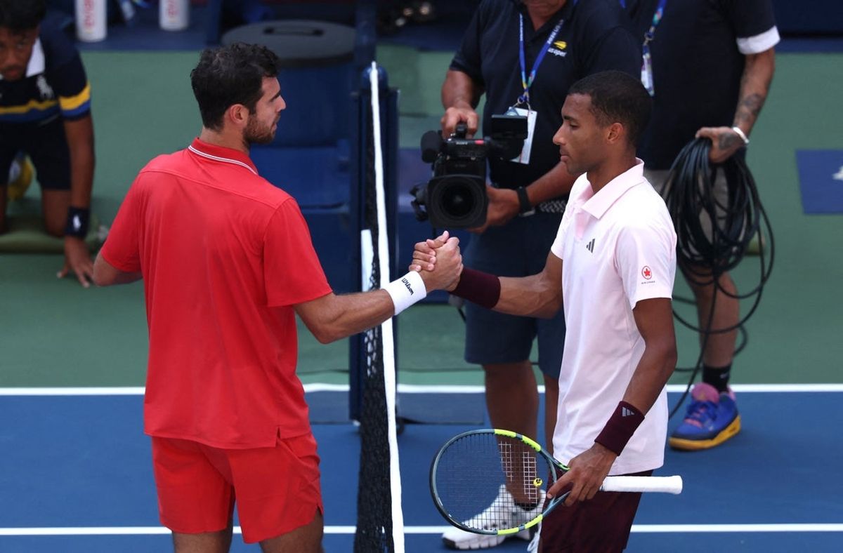 September 3, 2026; New York, United States;  Russia's Karen Khachanov and Canada's Felix Auger-Aliassime shake hands after their second round match.  Mandatory Credit: Geoff Burke-Imagn Images