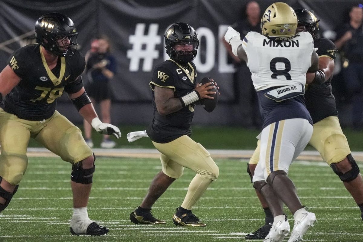 Sep 3, 2026; Winston-Salem, North Carolina, USA;  Wake Forest Demon Deacons quarterback Gio Lopez (3) drops back to pass against the Akron Zips during the second half at Allegacy Federal Credit Union Stadium.  Mandatory Credit: Jim Dedmon-Imagn Images