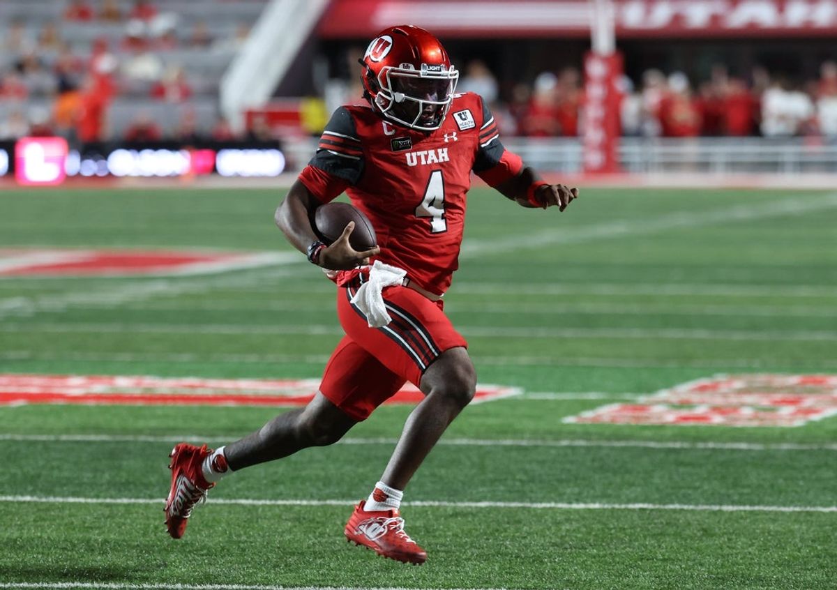 Sep 3, 2026; Salt Lake City, Utah, USA;  Utah Utes quarterback Devon Dampier (4) runs for yardage against the Idaho Vandals during the second quarter at Rice-Eccles Stadium.  Mandatory Credit: Rob Gray-Imagn Images