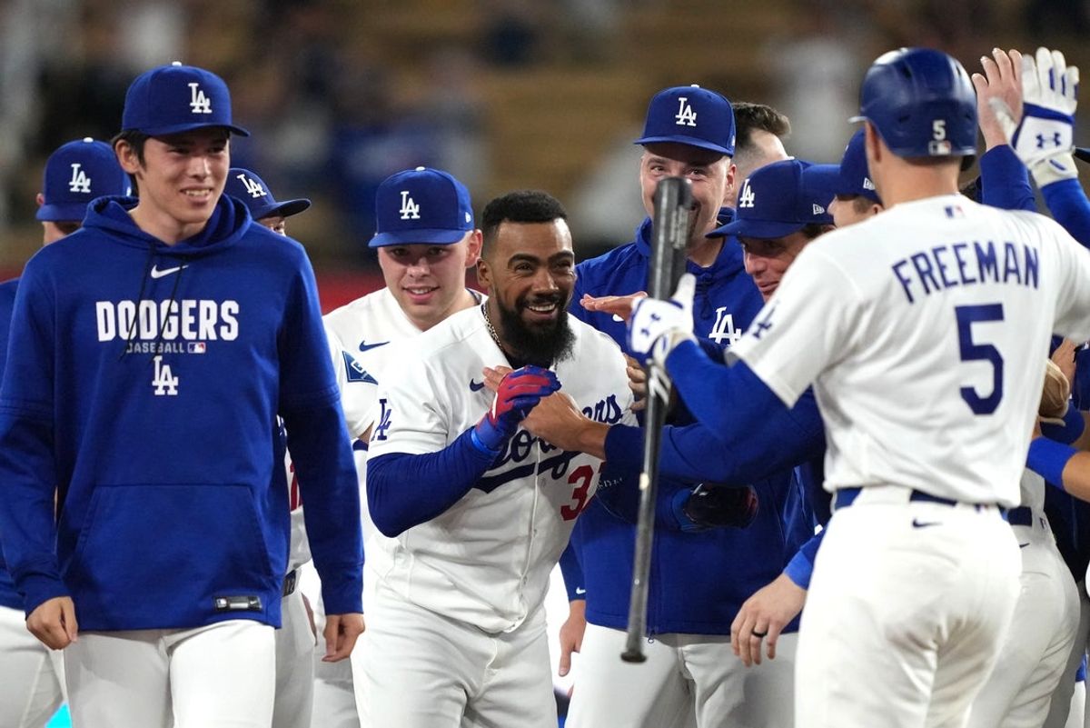 Sep 3, 2026; Los Angeles, California, USA;  Los Angeles Dodgers outfielder Teoscar Hernandez (37) celebrates with teammates after hitting a walk off two RBI double against St. Louis Cardinals pitcher Riley O'Brien (not pictured) during the ninth inning at Dodger Stadium.  Mandatory Credit: Kirby Lee-Imagn Images