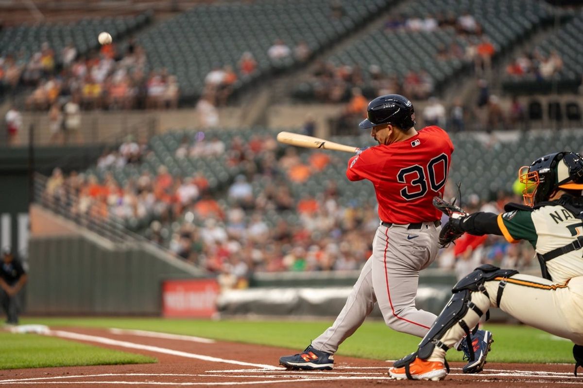 Sep 4, 2026; Baltimore, Maryland, USA;  Boston Red Sox first baseman Mickey Gasper (30) hits a home run during the first inning at Oriole Park at Camden Yards.  Mandatory Credit: Jamie LeBlanc-Imagn Images