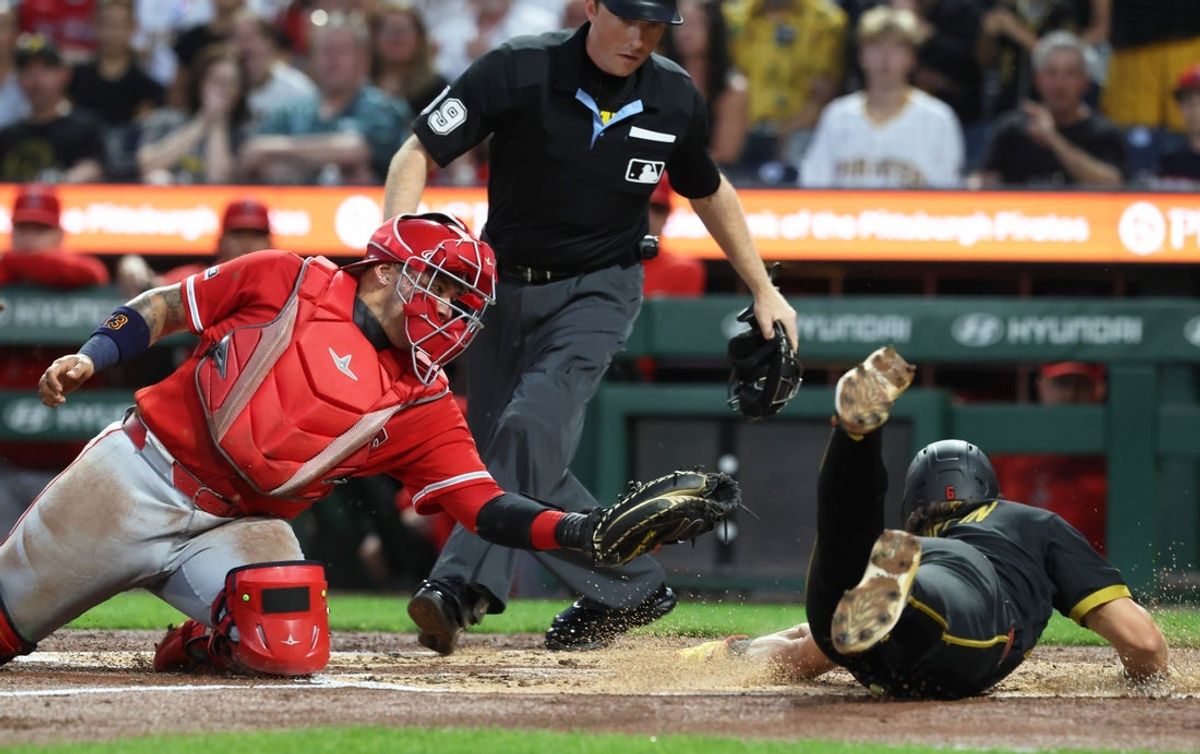 Sep 4, 2026; Pittsburgh, Pennsylvania, USA;  Pittsburgh Pirates shortstop Konnor Griffin (6) slides past Los Angeles Angels catcher Moises Ballesteros (12) to score a run during the second inning at PNC Park.  Mandatory Credit: Charles LeClaire-Imagn Images