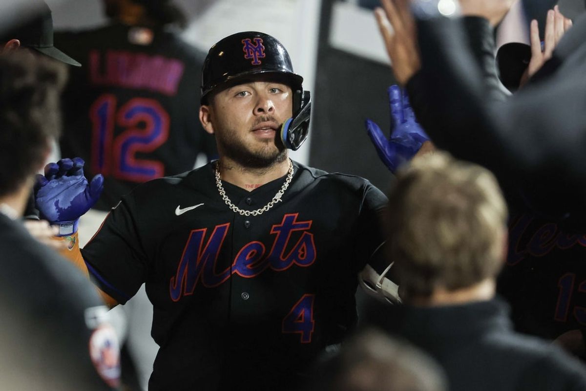 Sep 4, 2026; New York City, New York, USA;  New York Mets catcher Francisco Alvarez (4) celebrates in the dugout with his teammates after hitting a solo home run in the second inning against the San Francisco Giants at Citi Field.  Mandatory Credit: Wendell Cruz-Imagn Images