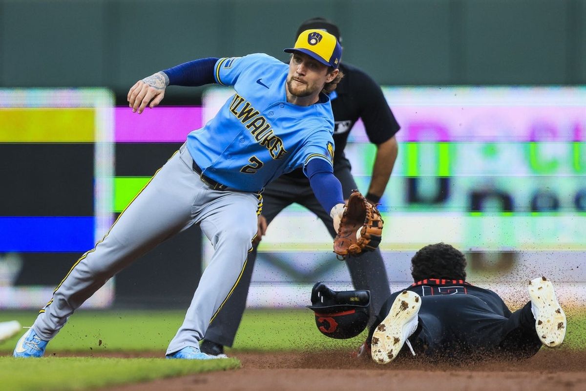 Sep 4, 2026; Cincinnati, Ohio, USA; Cincinnati Reds outfielder Dane Myers (17) steals second against Milwaukee Brewers second baseman Brice Turang (2) in the first inning at Great American Ball Park. Mandatory Credit: Katie Stratman-Imagn Images