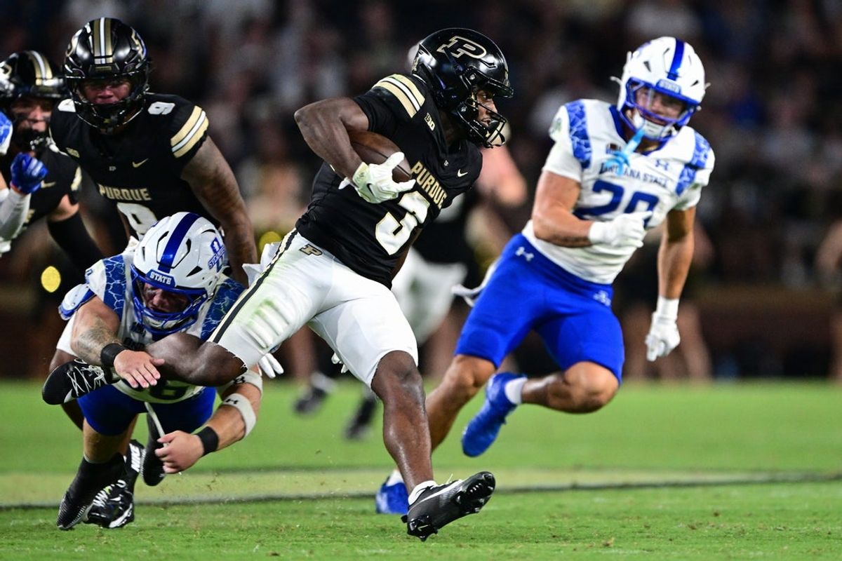 Sep 4, 2026; West Lafayette, Indiana, USA;  Purdue Boilermakers wide receiver Xavier Townsend (3) avoids a tackle by Indiana State Sycamores linebacker Alex Rose (36) during the third quarter at Ross-Ade Stadium.  Mandatory Credit: Marc Lebryk-Imagn Images