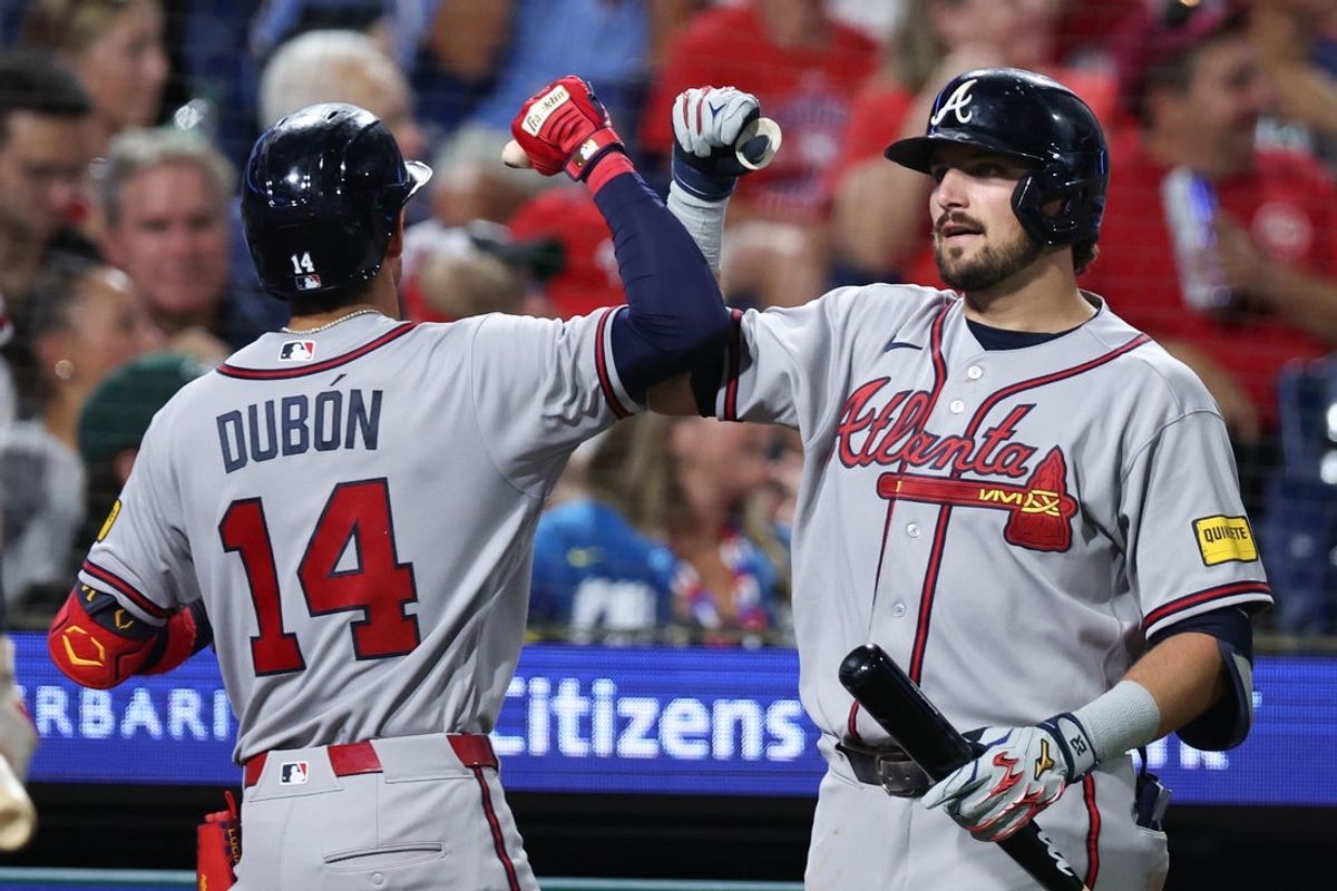Sep 4, 2026; Philadelphia, Pennsylvania, USA; Atlanta Braves left fielder Mauricio Dubon (14) reacts with third baseman Austin Riley (27) after hitting a two RBI home run against the Philadelphia Phillies during the eighth inning at Citizens Bank Park. Mandatory Credit: Bill Streicher-Imagn Images