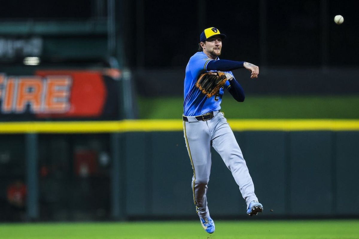 Sep 4, 2026; Cincinnati, Ohio, USA; Milwaukee Brewers second baseman Brice Turang (2) throws to first to get Cincinnati Reds shortstop Elly De La Cruz (not pictured) out in the seventh inning at Great American Ball Park. Mandatory Credit: Katie Stratman-Imagn Images