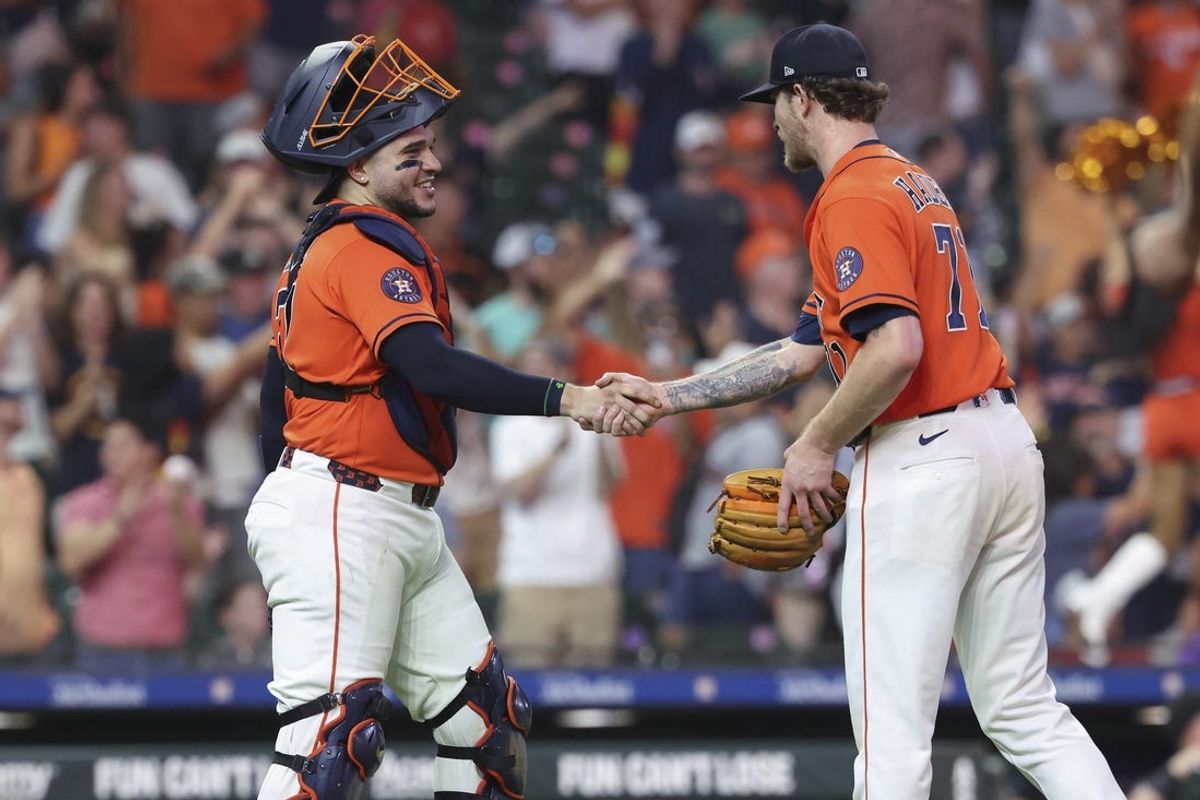 Sep 4, 2026; Houston, Texas, USA; Houston Astros catcher Yainer Diaz (21) celebrates with pitcher Josh Hader (71) after the game against the Arizona Diamondbacks at Daikin Park. Mandatory Credit: Troy Taormina-Imagn Images