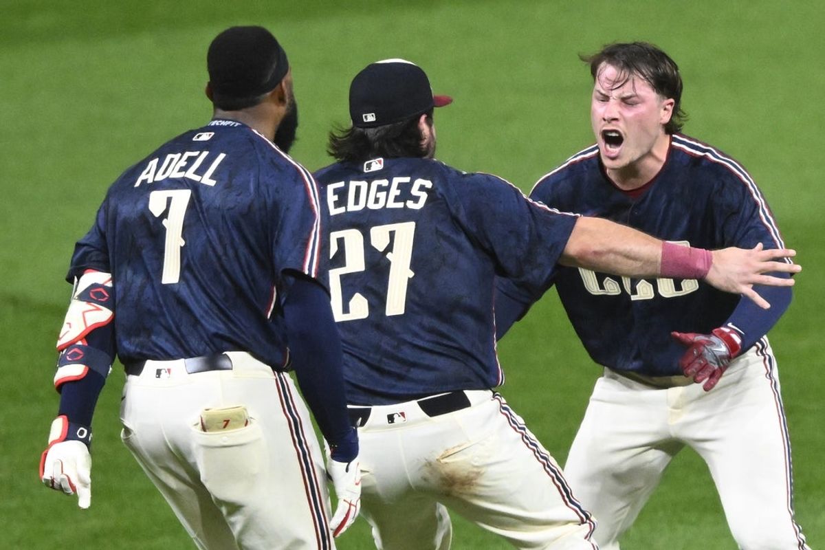 Sep 4, 2026; Cleveland, Ohio, USA;  Cleveland Guardians designated hitter Travis Bazzana (right) celebrates his game-winning single in the tenth inning against the Detroit Tigers at Progressive Field.  Mandatory Credit: David Richard-Imagn Images