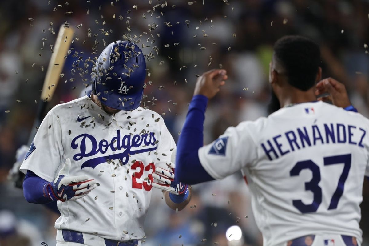 Sep 4, 2026; Los Angeles, California, USA;  Los Angeles Dodgers outfielder Kyle Tucker (23) hits a home run and is greeted by outfielder Teoscar Hernandez (37) during the sixth inning against the Washington Nationals at UNIQLO Field at Dodger Stadium.  Mandatory Credit: Kiyoshi Mio-Imagn Images