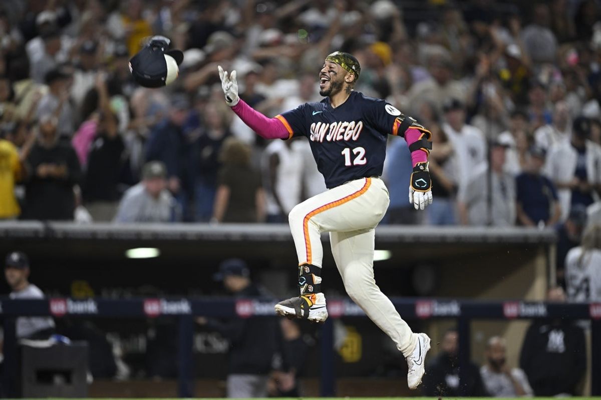 Sep 4, 2026; San Diego, California, USA;  San Diego Padres catcher Luis Campusano (12) celebrates after hitting a walk-off home run during the tenth inning against the New York Yankees at Petco Park.  Mandatory Credit: Denis Poroy-Imagn Images