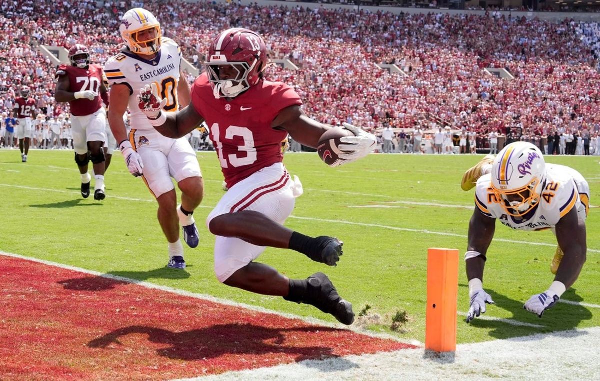 Sep 5, 2026; Tuscaloosa, AL, USA;  Alabama quarterback John Gazzaniga (13) Alabama running back EJ Crowell (13) scores his first career touchdown and the first touchdown of the season for the Crimson Tide as he slips past East Carolina linebacker Julien Davis (42) at Saban Field in Bryant-Denny Stadium. Mandatory Credit: Gary Cosby Jr.-Tuscaloosa News