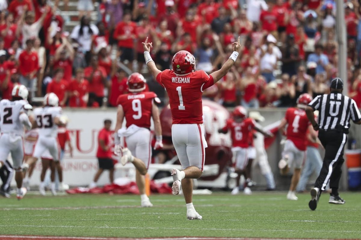 Sep 5, 2026; Houston, Texas, USA; Houston Cougars quarterback Conner Weigman (1) reacts as running back Re'shaun Sanford II (6) runs for a touchdown during the second quarter against the Oregon State Beavers at TDECU Stadium. Mandatory Credit: Troy Taormina-Imagn Images