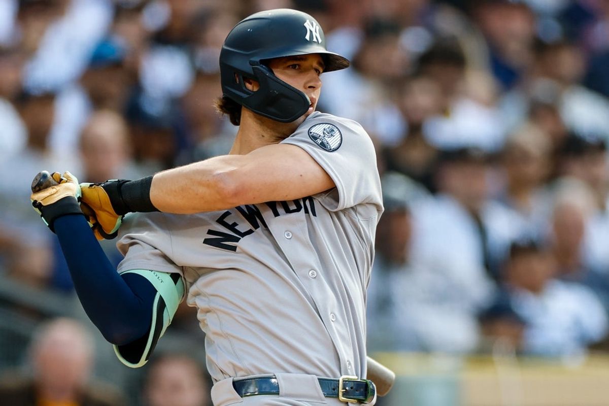 Sep 5, 2026; San Diego, California, USA;  New York Yankees center fielder Spencer Jones (78) hits a RBI double during the second inning against the San Diego Padres at Petco Park.  Mandatory Credit: David Frerker-Imagn Images