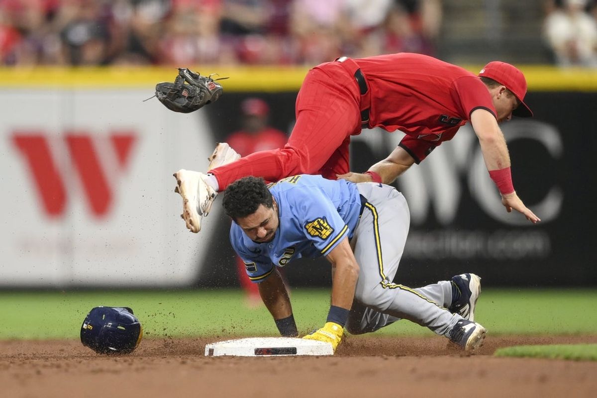 Sep 5, 2026; Cincinnati, Ohio, USA;  Milwaukee Brewers third baseman David Hamilton (6) slides into second base against Cincinnati Reds second baseman Matt McLain (9)  during the third inning at Great American Ball Park.  Mandatory Credit: Tanner Pearson-Imagn Images