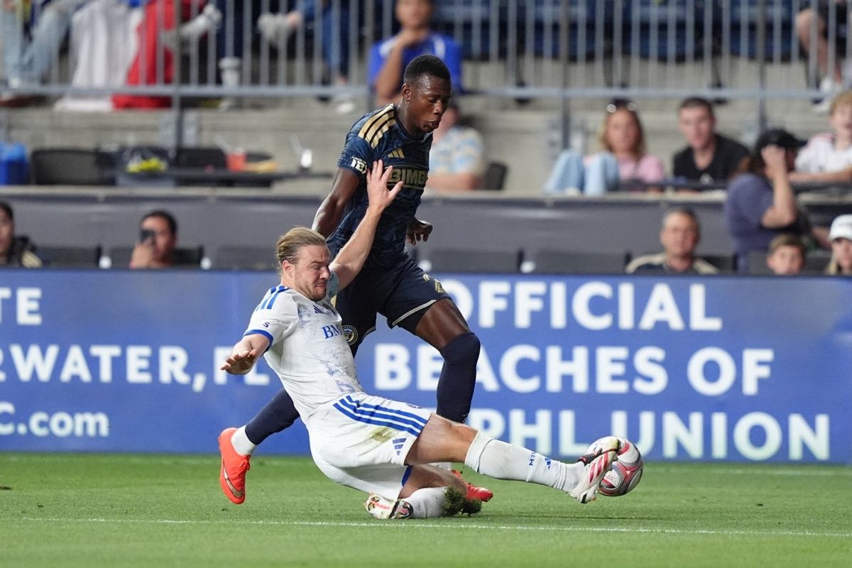 Sep 5, 2026; Chester, Pennsylvania, USA; CF Montreal midfielder Samuel Piette (6) tackles Philadelphia Union midfielder Danley Jean Jacques (21) in the first half at Subaru Park. Mandatory Credit: Kyle Ross-Imagn Images