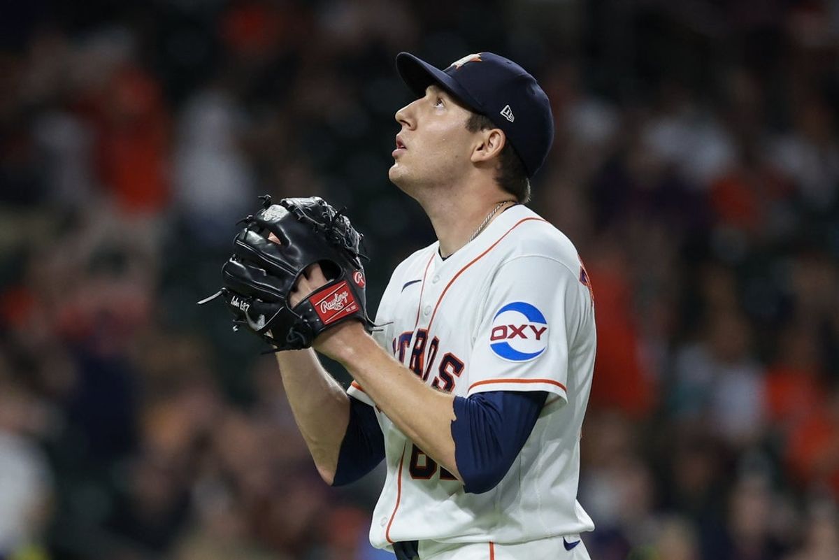 Sep 5, 2026; Houston, Texas, USA;  Houston Astros pitcher AJ Blubaugh (69) reacts after getting out of the seventh inning with  the Arizona Diamondbacks leaving a man in scoring position at  Daikin Park.  Mandatory Credit: Thomas Shea-Imagn Images